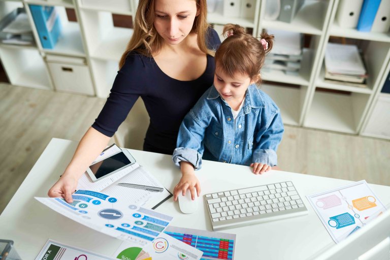 Young Mother at Workplace Young Mother at Workplace