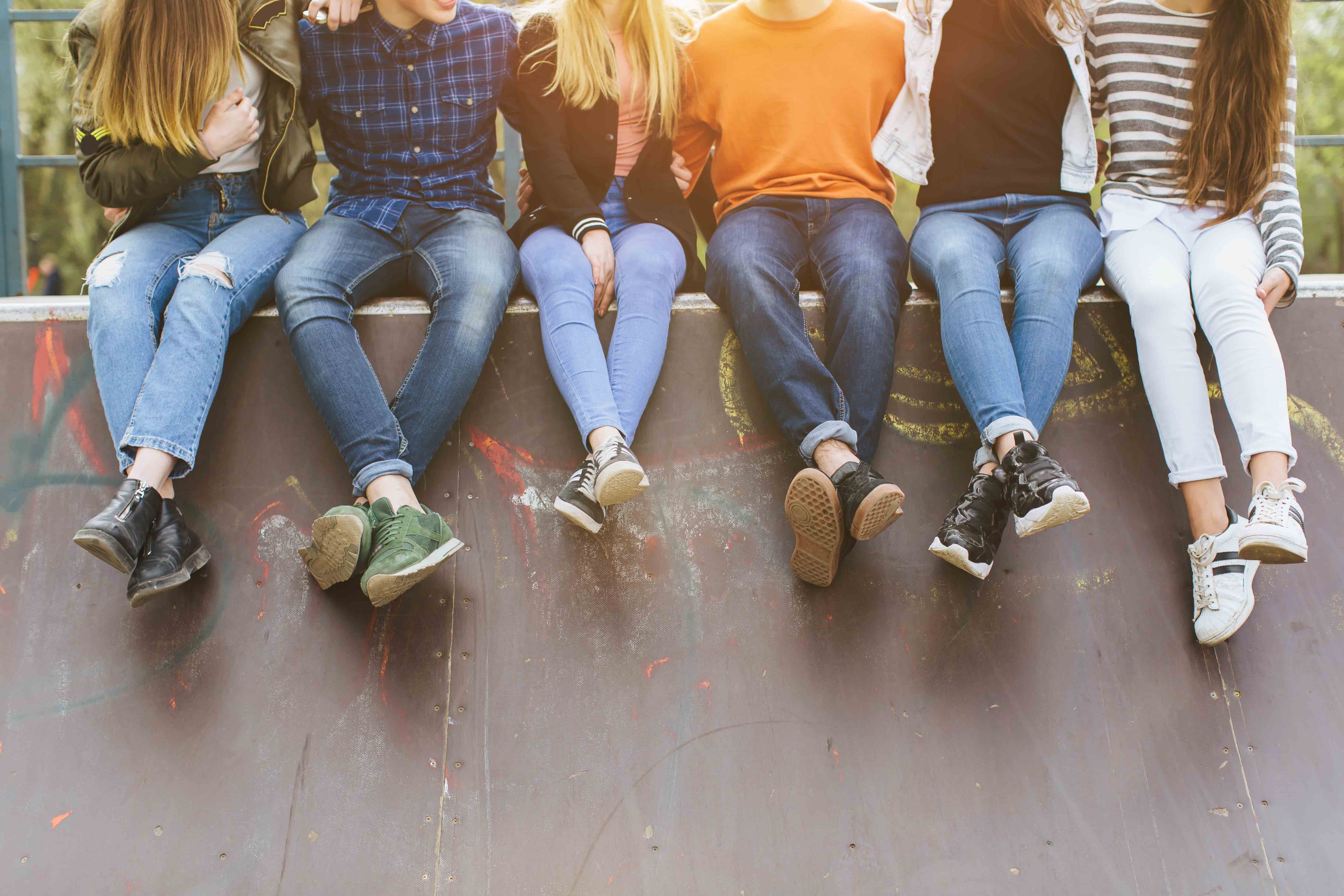 Summer holidays and teenage concept - group of smiling teenagers Summer holidays and teenage concept - group of smiling teenagers