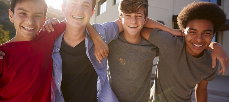 Portrait Of Male High School Student Friends Outside College Buildings Portrait Of Male High School Student Friends Outside College Buildings