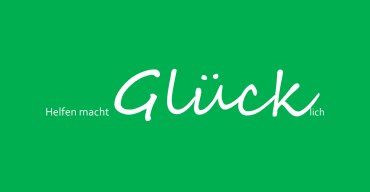 Grüne Karte, auf der mit weißer Schrift "Helfen macht glücklich" steht.